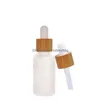 Förpackningsflaskor Frosted Clear Glass Droper Bottle With Bamboo lock Kosmetiska förpackningsglasögon Liquid Containers Drop Delivery Office S OTPMZ