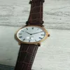 クラシックウォッチメカニカルハンドウィンドの動きのマン女性の腕時計ステンレス鋼の腕時計ホワイトフェイスレザーストラップ247c