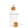 Förpackningsflaskor Frosted Clear Glass Droper Bottle With Bamboo lock Kosmetiska förpackningsglasögon Liquid Containers Drop Delivery Office S OTPMZ