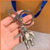 Fashion Key Holder Keychain Spaceman Luxurys Designers Keychain Car Key Portachiavi Keyring Cato Gram Llavero Porte CLES BAG CHARM228Q