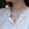Charm 's vergoldete Muschel-Charm-Halskette für junge Frau, süßer Party-Hochzeitsschmuck, Süßwasserperlen-Anhänger, Halsband, Geschenk 230727