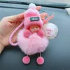 Keychains Real Fur Pompon Keyring Söt baby docka plysch bil nyckelkedja koreansk kvinnlig presentskolväska hänge diy