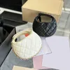 Cosmetic Bags Cases 23Ss Womens Classic Mini Moon Clutch Bags Lambskin Genuine Leather Black White Chain Arround Bag Outdoor Sacoche Lipstick Cosmetic Case Z230728