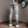 Pantalones de mezclilla elásticos con paneles en azul de Broken Jeans para hombre