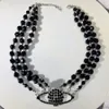 Trois rangées d'agate noire perle blanche saturne collier ras du cou designer de luxe en alliage classique faisant des bijoux pour femmes célèbres de haute qualité mode pandents colliers cadeau