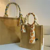 Emballage cadeau Wholes 100pcs Lot Sacs en jute personnalisés avec poignées Reusabla et sac fourre-tout recyclé Arc pour cadeaux d'achat personnalisés L296W