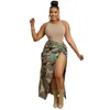 Designer camoskirt kvinnor klänningar vår sommar ny stil delad hög midja kamouflagekjolar kvinnlig last ankel längd kjol bulk föremål grossistkläder 9607