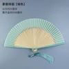 Produits de style chinois Éventail pliant en tissu de couleur pure de style chinois Éventail en bambou antique simple pour la photographie de danse Éventail décoratif d'été