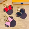 2023 Hot Fashion luxurys Key designers Buckle lovers Car Keychain Handmade Leather Keychains Men Women Bag Pendant Accessories brand