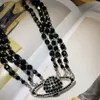 Trois rangées d'agate noire perle blanche saturne collier ras du cou designer de luxe en alliage classique faisant des bijoux pour femmes célèbres de haute qualité mode pandents colliers cadeau