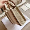 Kvinnor handväskor Woody Tote Shopping Bag Fashionable Shoulder Bag Mini Canvas Tyg Fritid Fashion Strandväska Crossbody Pures High Quality Material