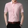 Camicie casual da uomo Camicia con bottoni stampati per ufficio d'affari 2023 Abiti maschili monopetto a manica corta coreana tutto-fiammifero