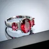 Eheringe Klassischer roter Kristall für Frauen Nette Ellipse Geometrische CZ Zirkon Verlobungsring Modeschmuck Weihnachtsgeschenk