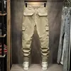 Jeans pour hommes High Street Fashion Hommes Coupe ample Multi Poches Designer Pantalon cargo décontracté Hombre Camouflage Hip Hop Joggers Salopette