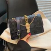 Borse a tracolla da donna all'ingrosso in fabbrica 6 colori elegante pressione atmosferica fiore borsa a catena serpente flip borsa con fibbia in oro tendenza di strada stampa zaino 3299 #