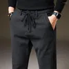 Pantaloni da uomo 2023 Inverno Caldo Moda casual Tessuto spazzolato Pile spesso Marca Slim Office Uomo Navy Black 38