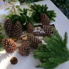 装飾的な花6pcs/パッククリスマスパインブランチ雪の人工植物木の花輪の家の装飾用の針xmas Year