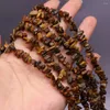 Pärlor 40 cm naturlig oregelbunden Tiger Eye Stone Rock Freeform-chips Tergel för smycken som gör DIY-armband Halsband Storlek 3x5-4x6mm