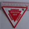 Danger Ejektionssätesnyckeltagg med anpassad broderad logotyp Acceptera vilken färg som helst och storlek 9 x 7 cm 100 st Lot304L