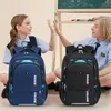Skolväskor barn skolväskor barn ryggsäck i grundskolväskan för tonåring pojkar vattentäta ryggsäckar bokväska mochila 230729