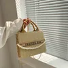 Duża torba słomiczna dla kobiet 2023 Nowy luksusowy designerski torebka Pearl Sieć kobiecego torby