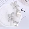 Kolczyki Dangle Eleganckie liście kropla moda w zawieszek perłowy luksus design złoty rhodium plated show biżuteria letnie prezent