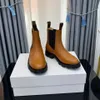 Botas de grife Triomphe celis tênis arco masculino outono inverno nova camada superior lisa couro bovino chelsea botas curtas de salto baixo botas femininas elásticas de um passo