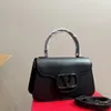 Bolsa de designer de luxo bolsa bola de crossbody saco de alta qualidade de moda de couro de couro real cadeia