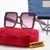 Occhiali da sole firmati da uomo lunette occhiali da sole firmati Occhiali da sole con lenti a fiori con lettera Occhiali da sole da viaggio unisex Occhiali da sole alla moda da spiaggia grigio nero con custodia