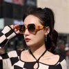 56% de desconto no atacado de novos óculos de sol de polarização simples para mulheres gradualmente mudados óculos de sol TAC óculos de rosto grandes TR da moda