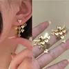Studörhängen mode gyllene enkla geometriska korsningsbågar örhängen flickor punk båge för kvinnor 2023 trendig temperament bijoux gåva