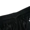 Męskie dżinsy High Street Slim dżinsy w trudnej sytuacji jeanse dżinsowe designerskie skórzane spodnie z otworami litery rozdarte kolano rozerwane na M294K