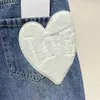 Vår sommarmo ny co samma höga midja elastiska fria ljusblå trasiga hjärtformade zhangzi raka rör denim byxor