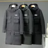 2023 Winter Star Designer Brand Outdoor Spor Mountaineing Suit Suit Men Shicked Over Knee Longe Coa Hooded Pocket
