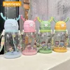 Botellas de agua de 600ml, vaso con pajita, bonita botella de dibujos animados para niños con correa, de plástico a prueba de fugas, para chico y estudiante, para viajar