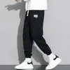 Pantaloni da uomo Pantaloni sportivi da uomo a gamba larga Articoli larghi in pantaloni Young La Felpa maschile vintage in stile coreano