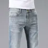 Summer Mens Jeans Edition Small Foot Elastic Slim Fit Haut de gamme Marque Leather Label Men Pants