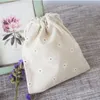 Beyaz papatya keten hediye çantaları 9x12cm 10x15cm 13x17cm 50 Parti Şeker Favor Çanta Tutucuları Makyaj Takıları Drawstring Pouch273p