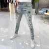 Jeans masculino Calça jeans de luxo 2023 Primavera/verão Estampa brilhante Slim Fit Streetwear Roupas de grife Cowboy Calças casuais estrela