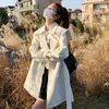 Trench da donna moda donna elegante giacca cappotto bianco medio-lungo 2023 autunno doppio petto con cintura sciolto casual giacca a vento coreana