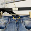 Mäns jeans designer Nya herrutgåva elastiska smala passformar små fötter blå denim tårar tvättade gamla långa svarta jeans byxor trp5