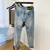 Mäns jeans designer Nya herrutgåva elastiska smala passformar små fötter blå denim tårar tvättade gamla långa svarta jeans byxor trp5