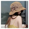 Breda brim hattar enkel sommarstrand hatt kvinnlig casual panama curly lady märke kvinnor platt bowknot halm cap flickor japansk sol