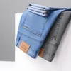 Mäns jeans Loose Thin for Business Mid-High midjan Stretch Summer Casual Classic Denim Trousers Male Black Blue Grey Pants