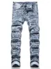 Jeans da uomo 2023 Spring Street Taglio strappato Moda spezzata Pantaloni a matita slim elasticizzati a vita media Abbigliamento moto hip-hop