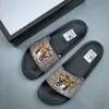 新しいLuxurys Designer Rubber Slipper Womens Classic Sandalフラットカジュアルシューズサンダールキャンバスビンテージ夏の屋外ラバトラベルスライドメンズビーチスライダーレディ