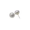 Boucles d'oreilles clous français mettant en évidence chignon cuit à la vapeur perle plate argent 925 aiguille tempérament Niche Ins Port vent oreille accessoires en gros