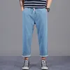 Męskie dżinsy męskie dżinsy plus 42 44 mężczyzn moda Hip Hop Streetwear szerokie nogi dżinsy elastyczne talia dżinsowe spodnie Harem 230729