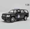 Druckguss-Modellautos 136 hohe Nachahmung Legierung ModellautoChevrolet TAHOE zurückziehen Metallauto Toy2 offene Tür statisches Modell Spielzeugfahrzeug kostenloser Versand x0731