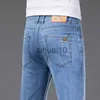 Jeans da uomo Primavera Estate Jeans dritti sottili da uomo Tessuto liscio Pantaloni larghi in denim elasticizzato Pantaloni maschili di marca Blu J230728